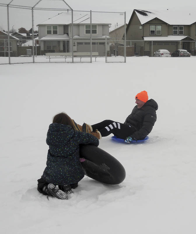 amanda and noah sledding